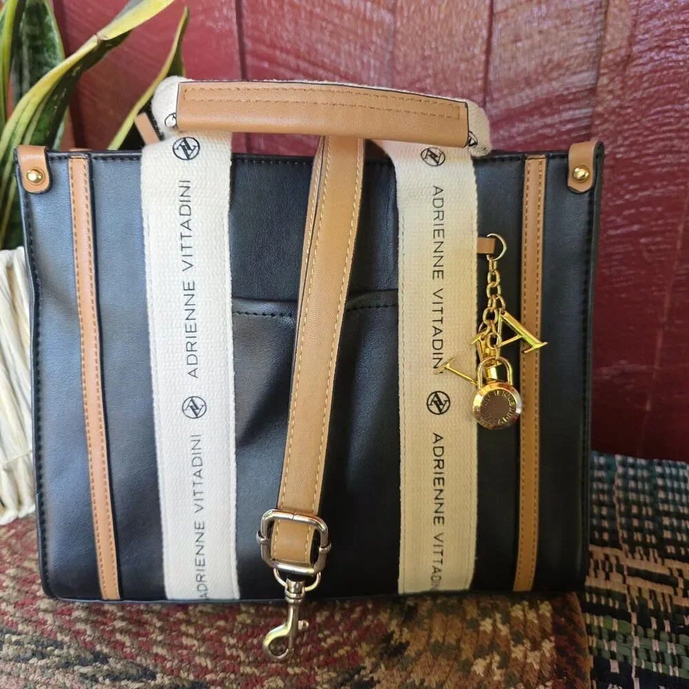 Adrienne Vittadini Black Tote Canvas Logo Straps w AV Charm Top Zip Closure EUC